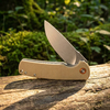 GT-T0067 folding knife features D2 steel blade with stonewash finish, G10 handle and ball bearing pivot. Compact lightweight EDC pocket knife for camping, outdoor daily carry.