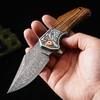 GT-DM052 Damascus Blade Pocket Knife, Carved Steel Head Zebra Wood Handle Outdoor Portable Folding Knife GT-DM052 Damascus Blade Pocket Knife, Carved Steel Head Zebra Wood Handle Outdoor Portable Folding Knife